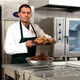 Image for article titled ‘I Said Do It,’ Barks Cheesecake Factory CEO As Hesitant Chefs Hold Whole Fried Chicken Over Bowl Of Chocolate Pudding